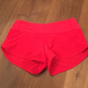 red lululemon shorts